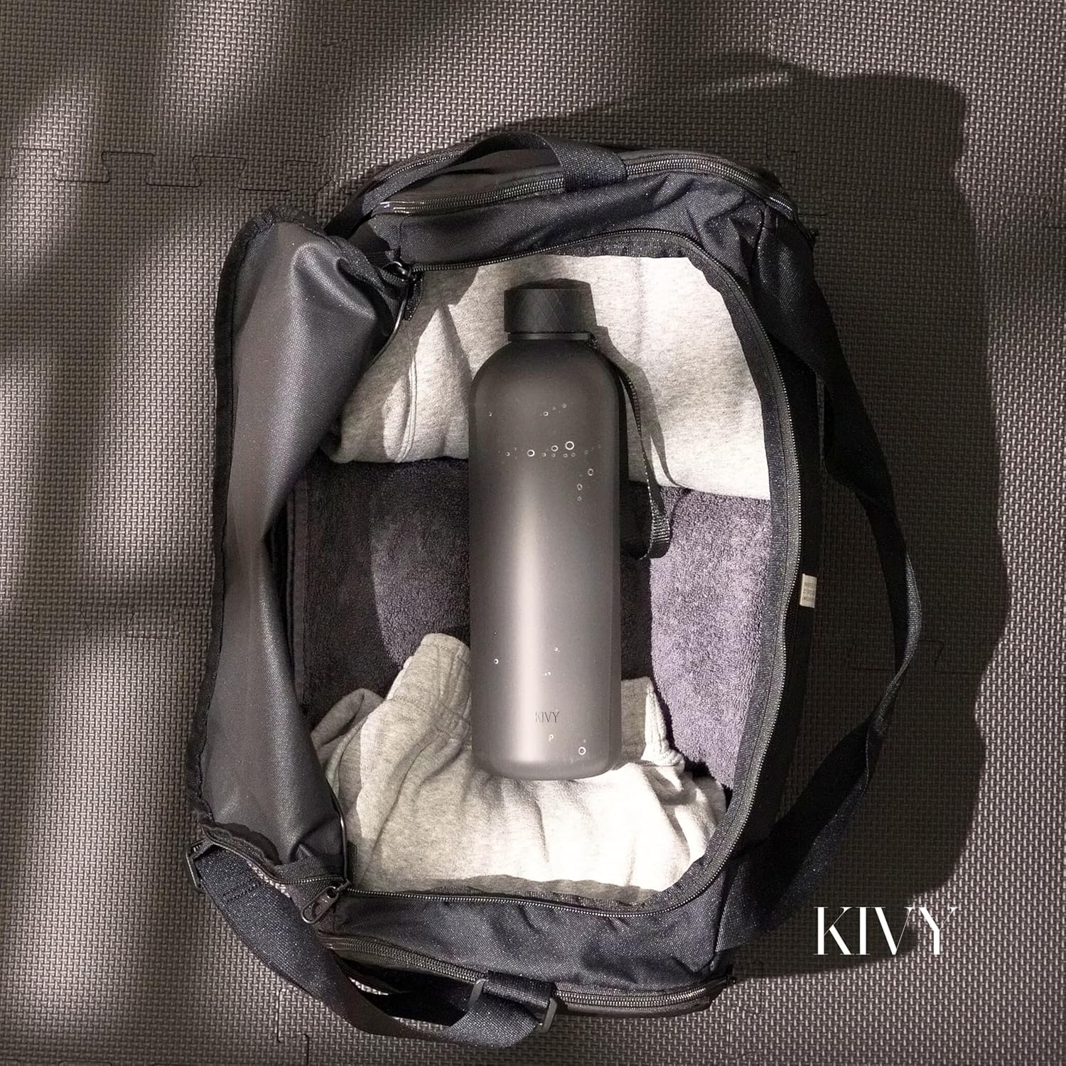 KIVY Large Water Bottle 50oz [Lightweight & Shatterproof] Fits Backpack & Cupholder for Travel, Sports, School - Extra large water bottle no straw - 1.5 Liter water bottles - 50oz Water bottle Green